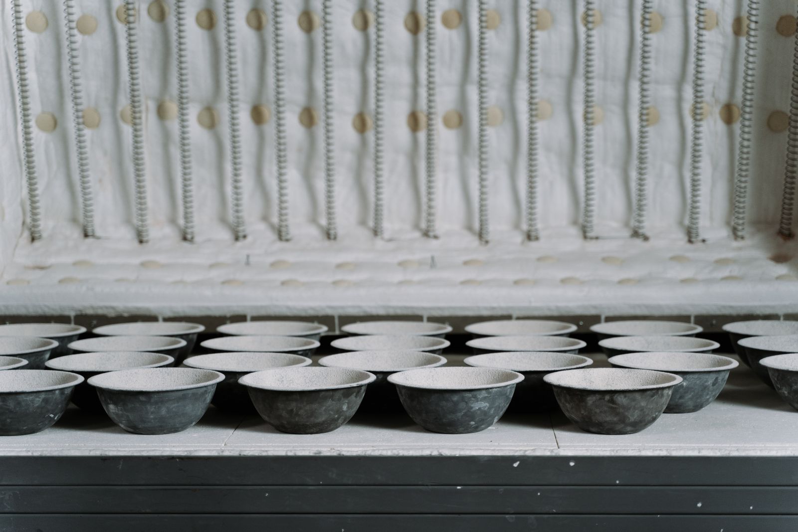 Ceramic ware stacked inside an industrial kiln