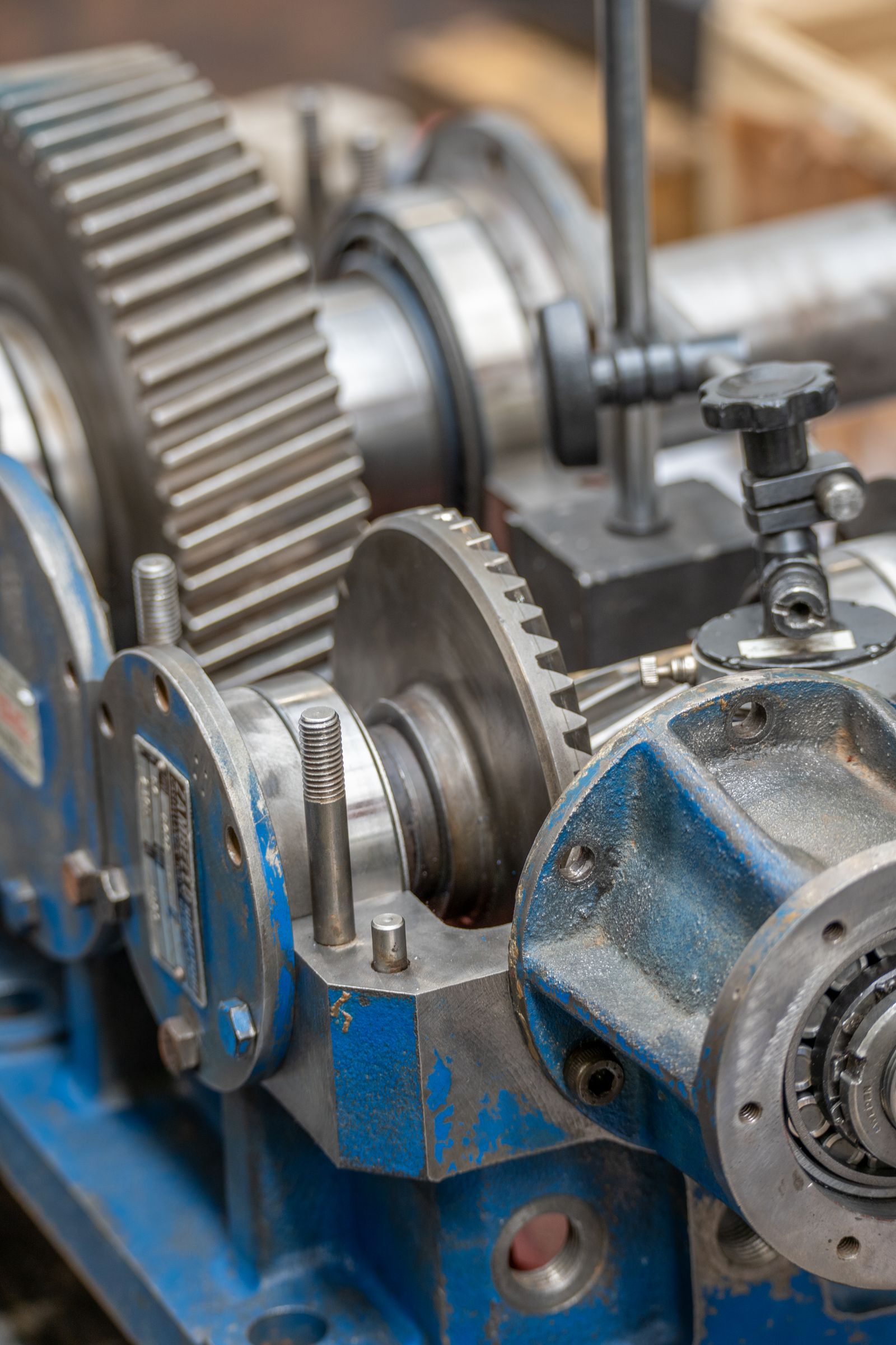 Close-up of heavy industrial gears and wear parts