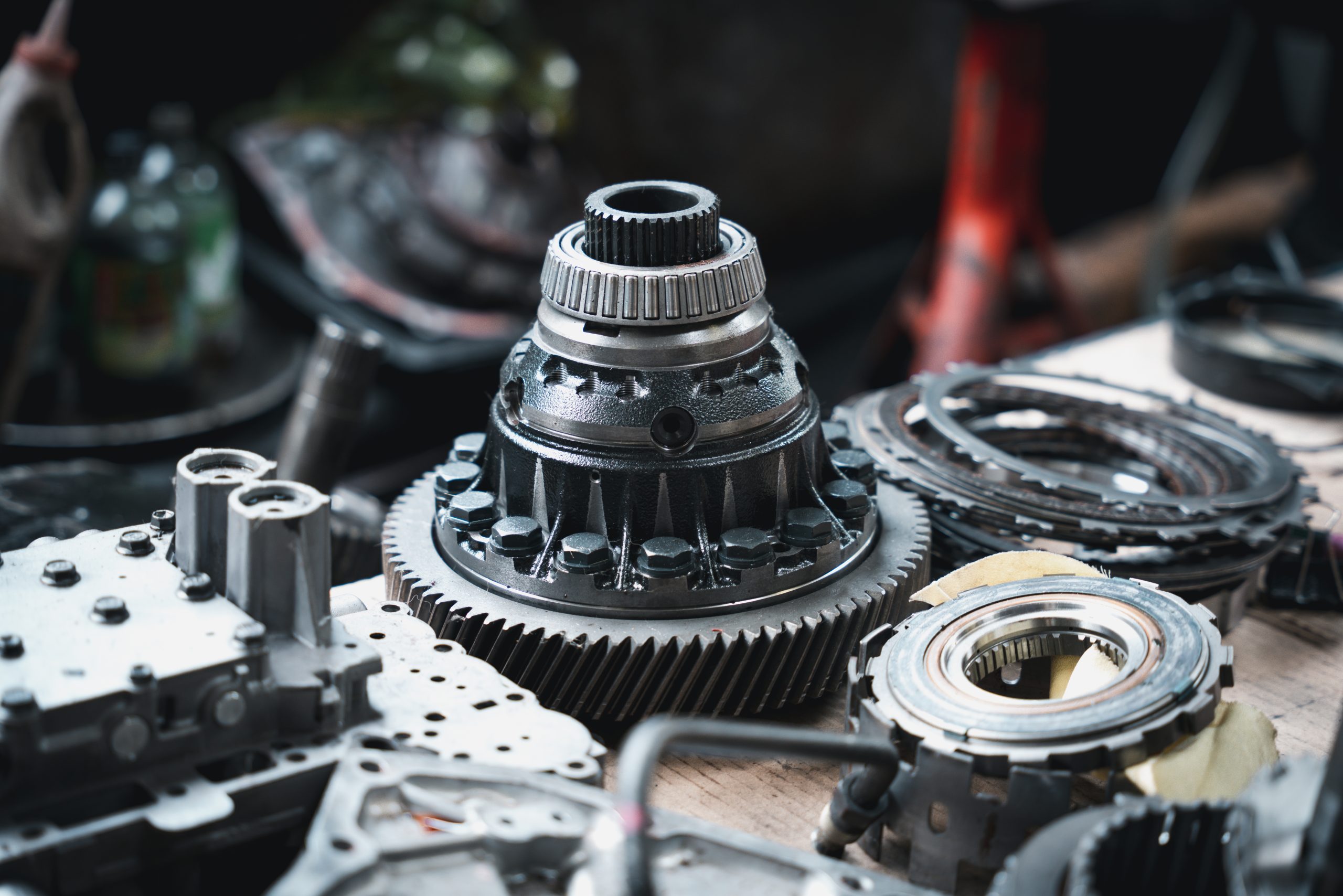 Close-up of heavy industrial gear wheels and wear components